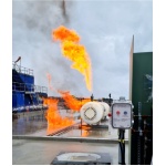 fire_fighting_training_facility_with_organge_flames_from_a_white_tank__small_remote_polybox_in_the_corner
