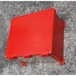 Custom red spray painted box or, a custom spray painted green outdoor box sitting on the ground