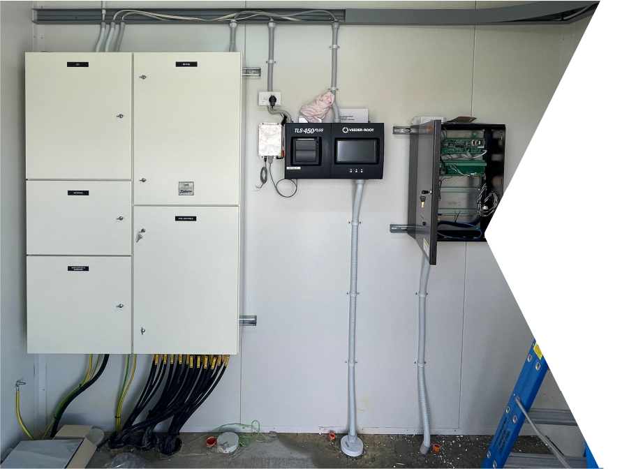 Switchboard with LCD screen and controls cabinet for fuel forecourt controls.