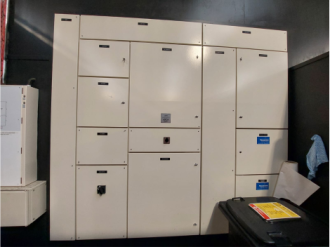 Large 250A main switchboard for heavy machinery industrial yard on black wall