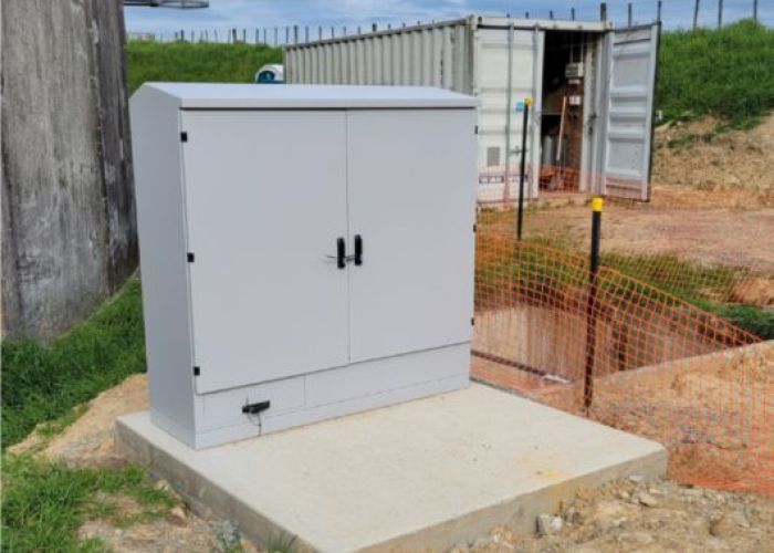 Medium size grey kiosk for a large pump control switchboard
