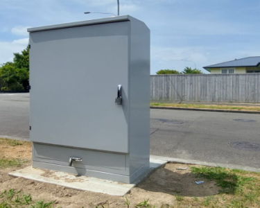wastewater pump kiosk on the side of the road 