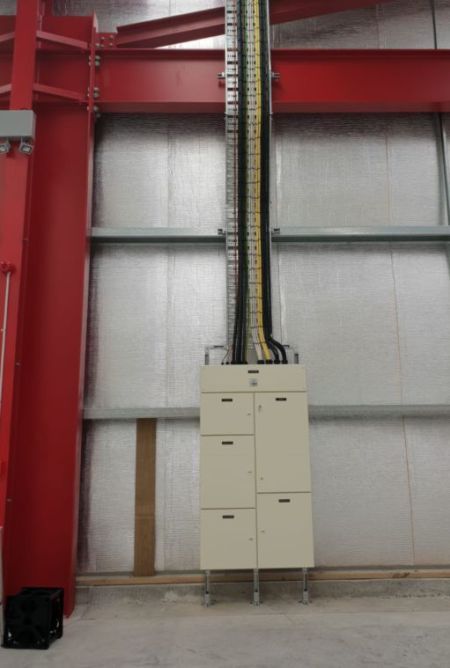250A switchboard with 16TP Pan assembly with cable tray installed in warehouse