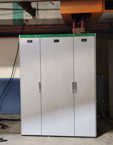 Industrial white switchboard with 2500A main ACB switch in a factory application